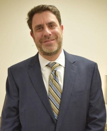 Commission Member Rabbi Peter Berg.