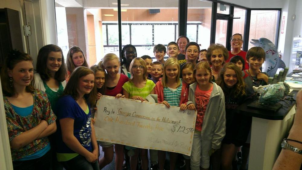 Mountain View students with donation check. JPG.JPG