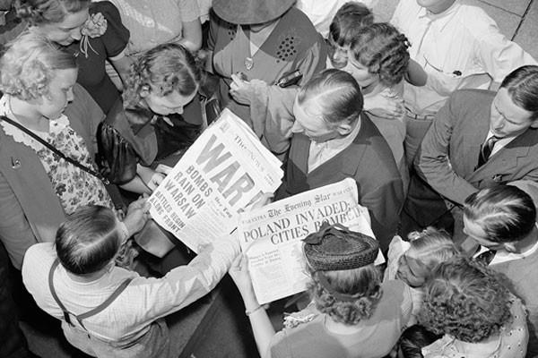 People look at Washington, DC, newspapers on September 1, 1939—the day Nazi Germany invaded Poland, starting World War II. Harris & Ewing Collection:Library of Congress.jpg